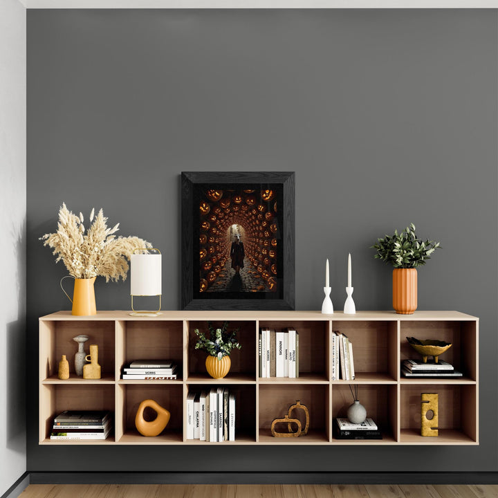 Weirdcore Halloween art print of a goat-headed man in a Victorian waistcoat walking a cobblestone path under a glowing jack-o’-lantern tunnel. Creepy, surreal wall art with liminal space and eerie, magical vibes.