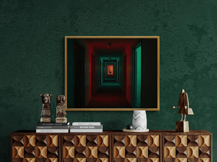 Surreal reindeer Christmas print of reindeer in liminal space hallway with red and green lighting.