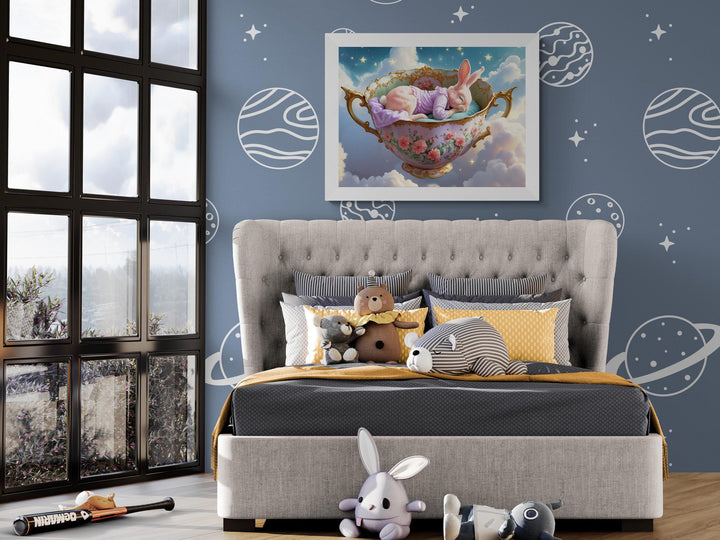 Dreamy fantasy artwork of a pink bunny peacefully sleeping in a gold-trimmed floral teacup floating among clouds and glowing stars — perfect nursery wall art for whimsical or celestial decor lovers.