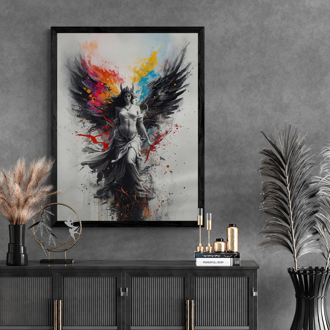 A dark-winged celestial angel in flowing white robes surrounded by vivid splashes of paint in blue, red, and gold.
