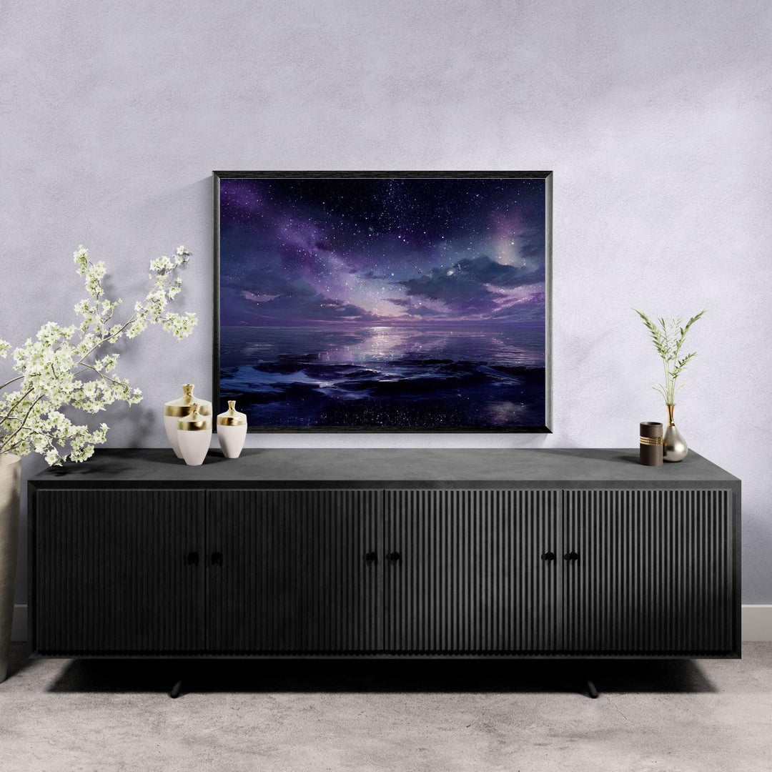 Celestial ocean wall art depicting a calm reflective sea beneath a vast starry night sky, blending cosmic light with serene ocean atmosphere.