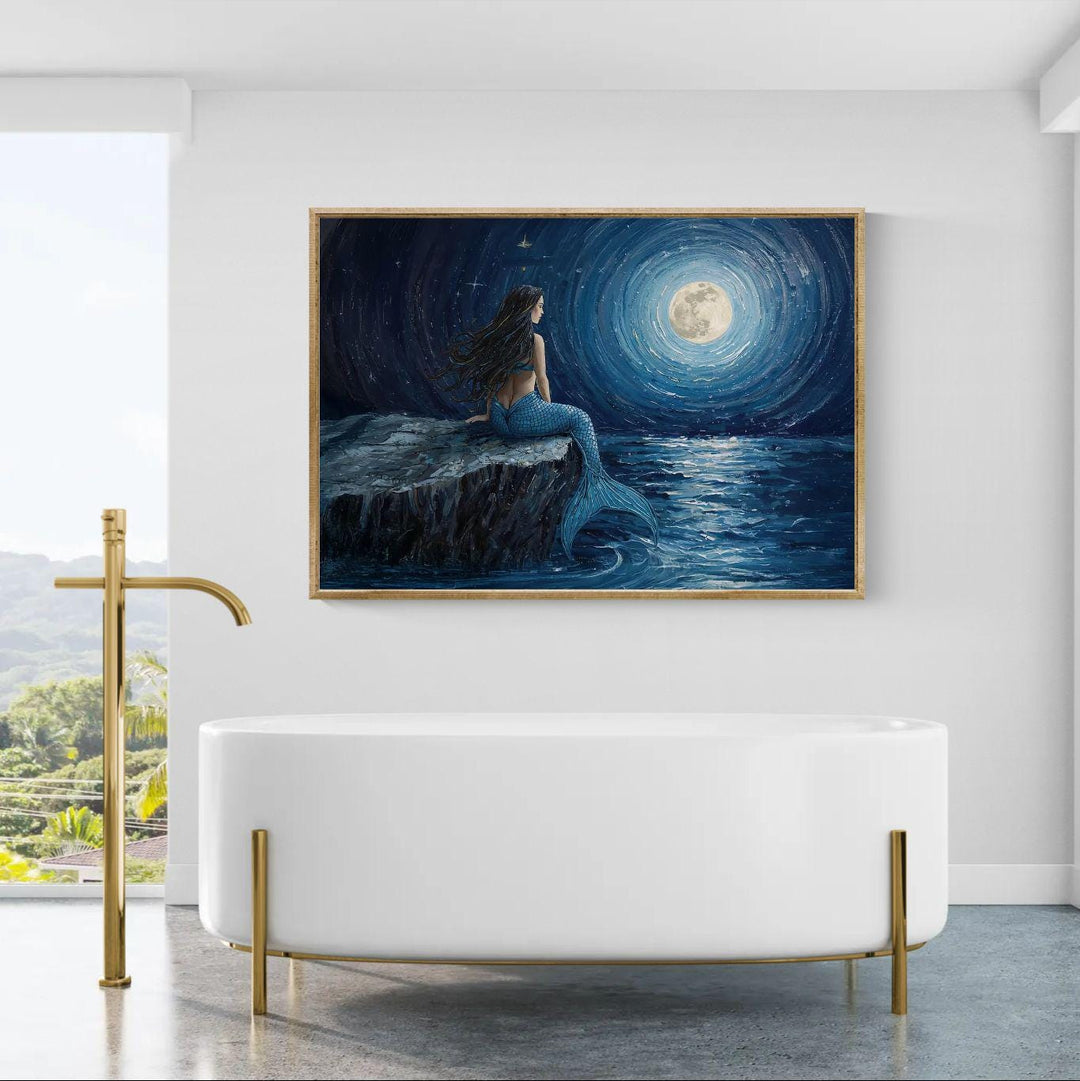 Night ocean mermaid wall art featuring a solitary mermaid seated by the sea at night beneath a glowing moon, painted in deep blue tones with a calm, mystical atmosphere