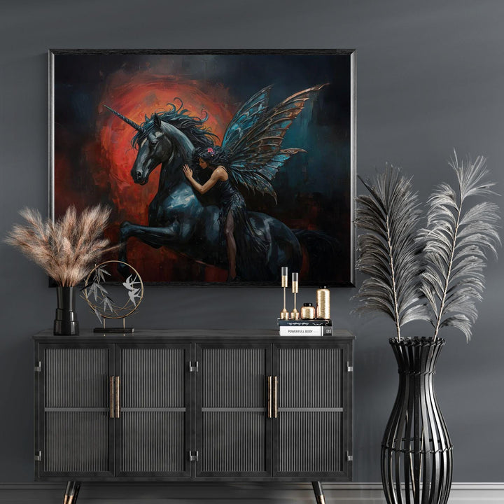 Dark fantasy wall art depicting a mystical unicorn and winged fairy in an emotional gothic dreamscape with deep shadows and glowing red tones