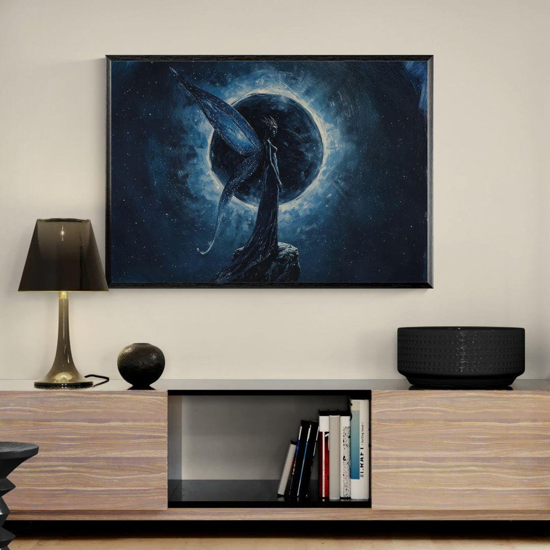 Celestial fantasy wall art featuring a moon fairy with flowing wings standing before a glowing eclipse, surrounded by deep blue cosmic textures.
