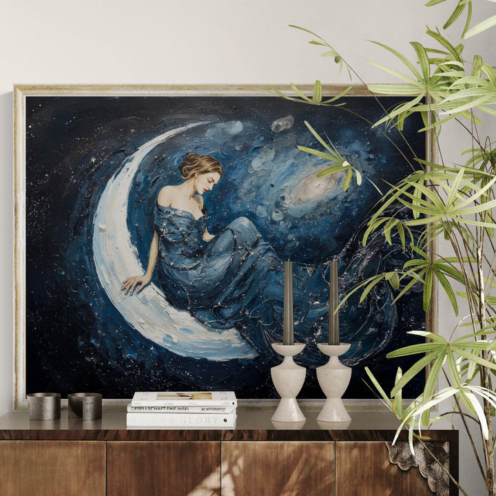 Moon goddess wall art featuring a serene celestial woman seated on a crescent moon within a star-filled night sky, perfect for fantasy and lunar home décor