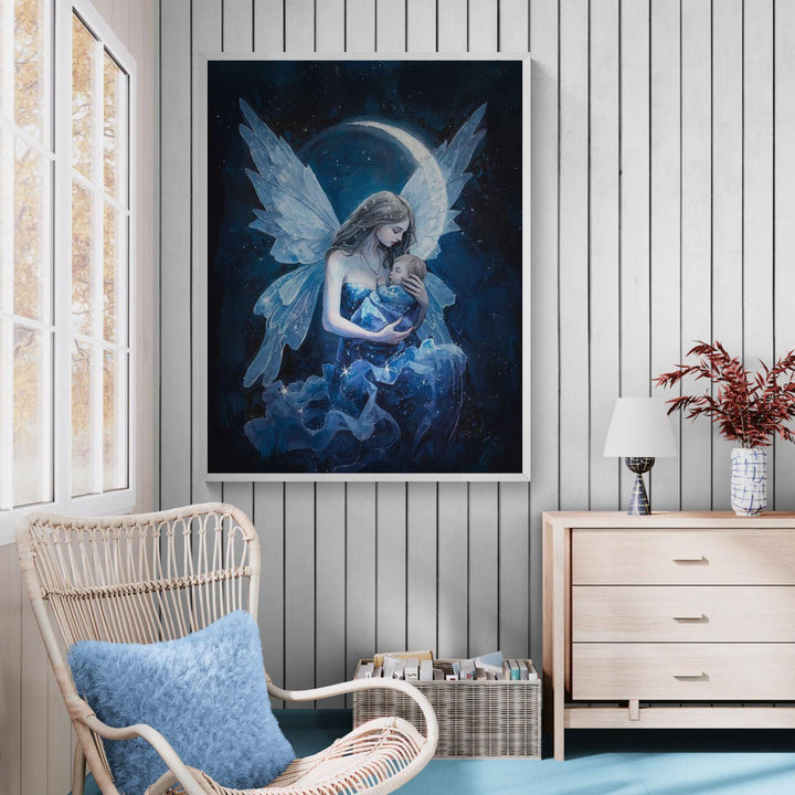 Celestial fairy mother wall art showing a winged mother holding her sleeping baby beneath a glowing moon and starry night sky, designed as peaceful nursery décor for new moms.