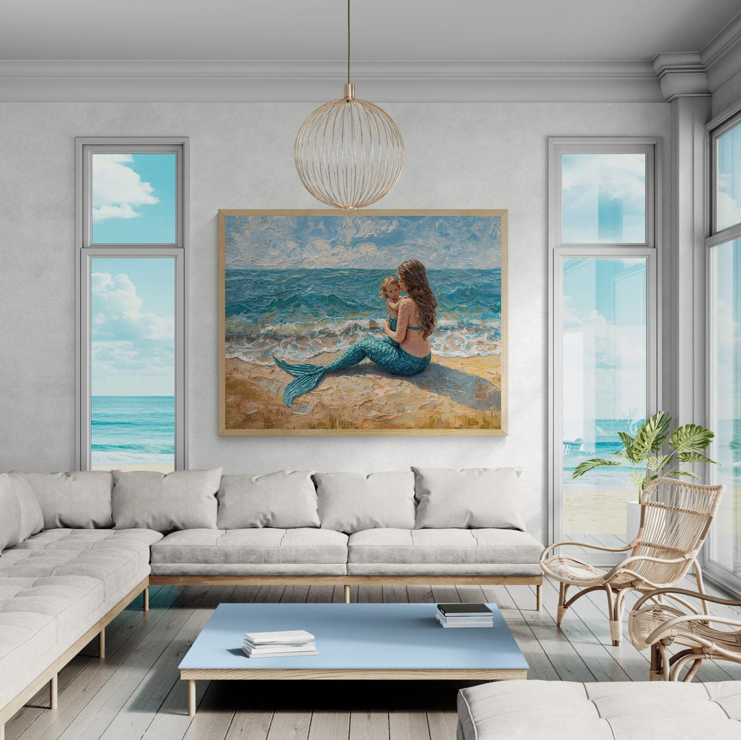 Painterly fantasy illustration of a mermaid mother sitting on a sandy beach holding her child while turquoise waves roll gently behind them.