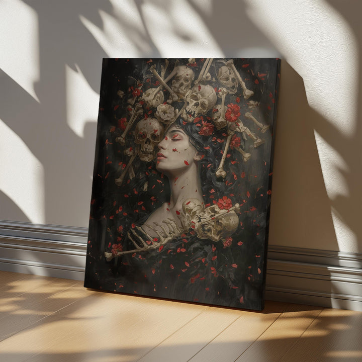 Moody gothic skull wall art featuring a serene dark-haired woman crowned with skulls and crossed bones, surrounded by red flower petals against a deep shadowy background, symbolizing beauty and mortality in a dramatic dark fantasy style.