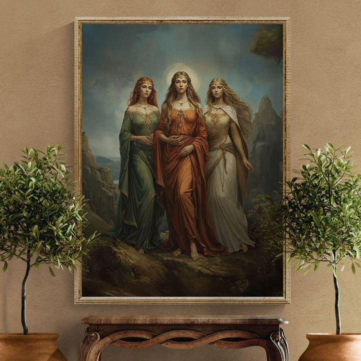 Celtic goddess wall art featuring three divine feminine figures inspired by Brigid, Morrigan, and Danu walking together in a glowing mythic landscape